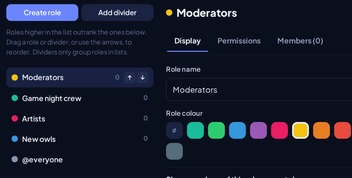 The roles editor in server settings: Moderators, Game night crew, Artists and New owls, each with a colour.